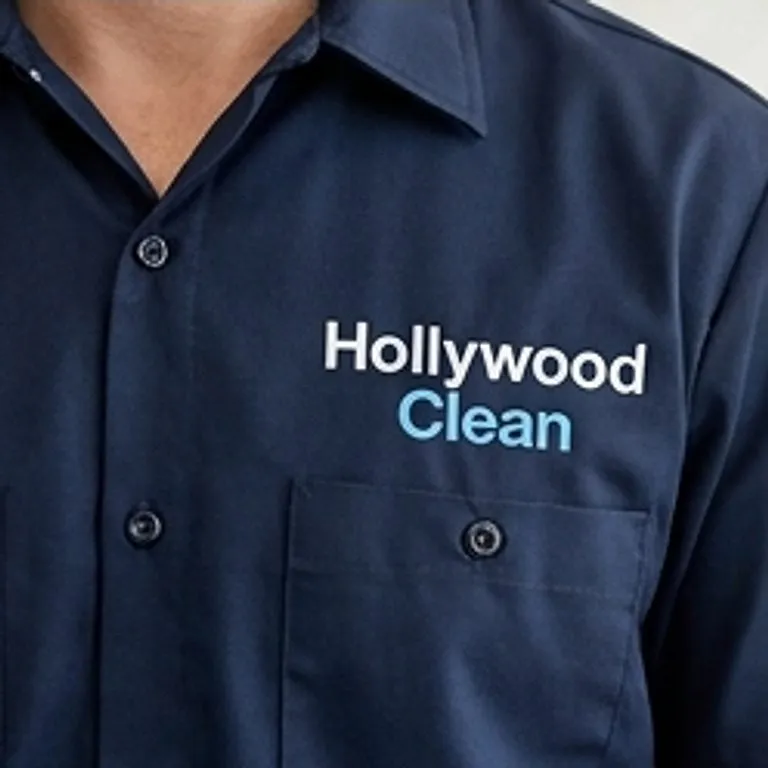 close-up of cleaner's uniform with logo